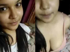 Beautiful girl flaunts her ample breasts for her boyfriend